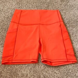 Fabletics Orange 6" On the Go HIgh Waisted Bike Shorts NWT 2 POCKETS! $49.95 Tag